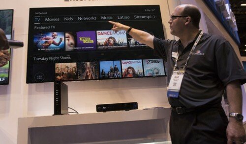 With Time Warner Cable deal fading in background, Comcast propelled by