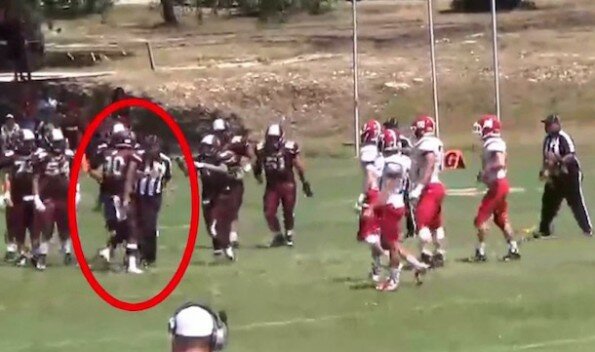 Texas High School Football Player’s Reaction to Referee Throwing Penalty Flag photo